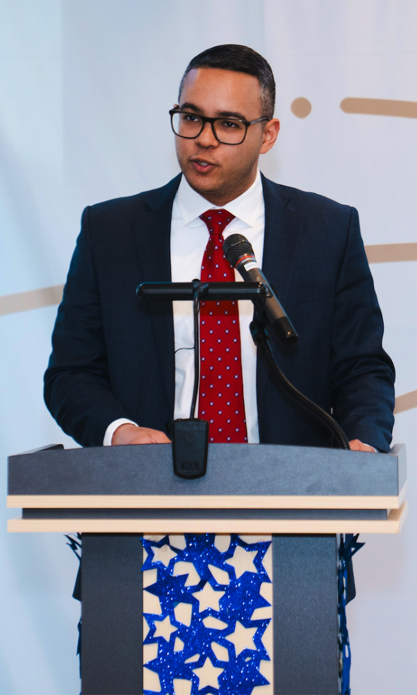 Robinson Aquino speaking at an event
